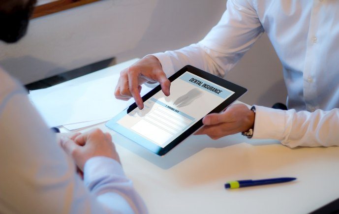 Dental insurance forms on tablet computer