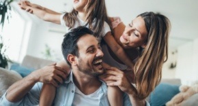 Man and woman with healthy smiles after cosmetic dentistry