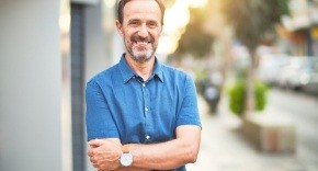 Man smiling after emergency dentistry visit